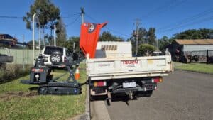 Slanetrac HT1000 mini dumper loading isuzu truck