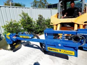 Slanetrac HS75 saw head attached to Slanetrac SA1000 frame, on a skid steer.
