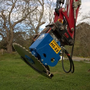 Slanetrac HS55 Saw head for tree branch cutting. Attached to a Yanmar Excavator with a tilt hitch.