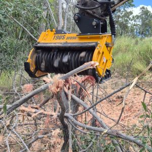 FEMAC T9US Forestry mulcher mulching a wattle bush in Australia